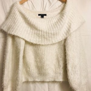 Super soft off-the-shoulder white fluffy sweater.